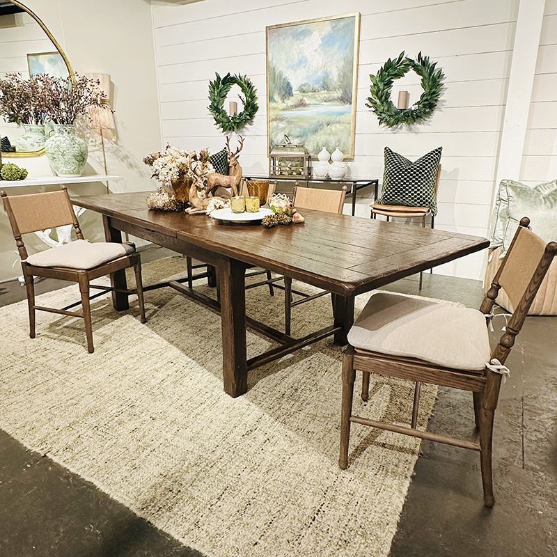 French planked oak dining extension table with rush detail and cushion. French planked oak dining extension table with rush detail and cushion.